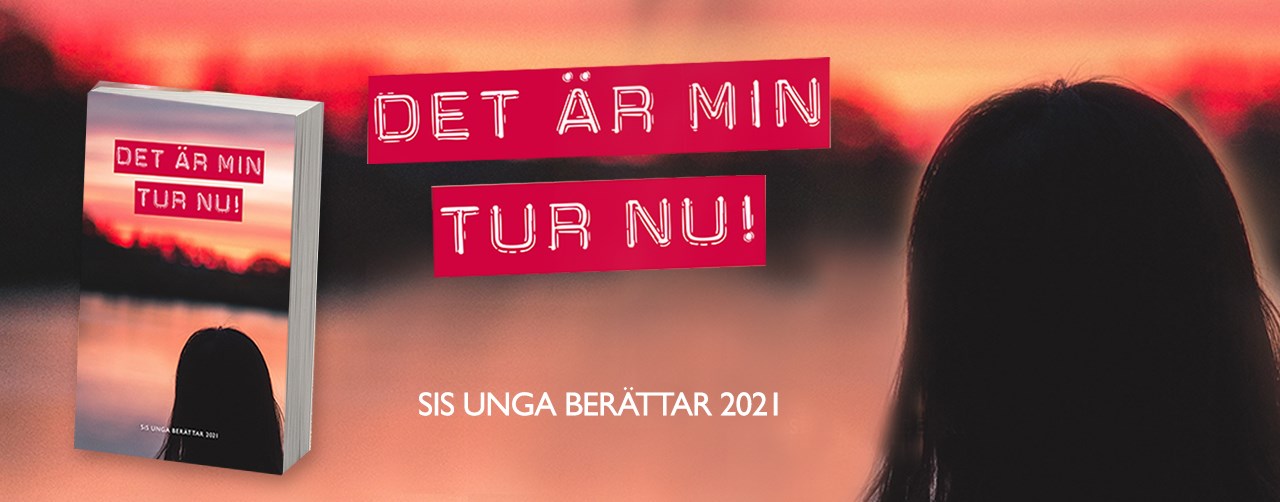 bilden visar en person som tittar ut mot en sjö under en mörk kväll